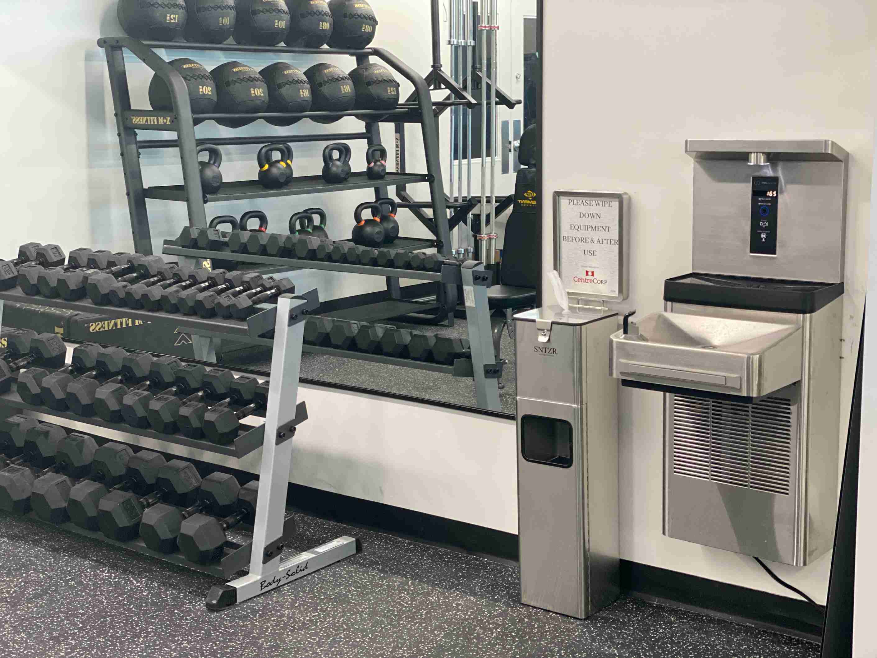 Facility wipe station in a fitness room